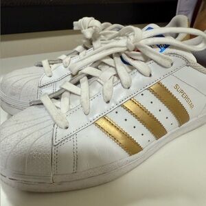 White Athletic Shoes with Red Insole